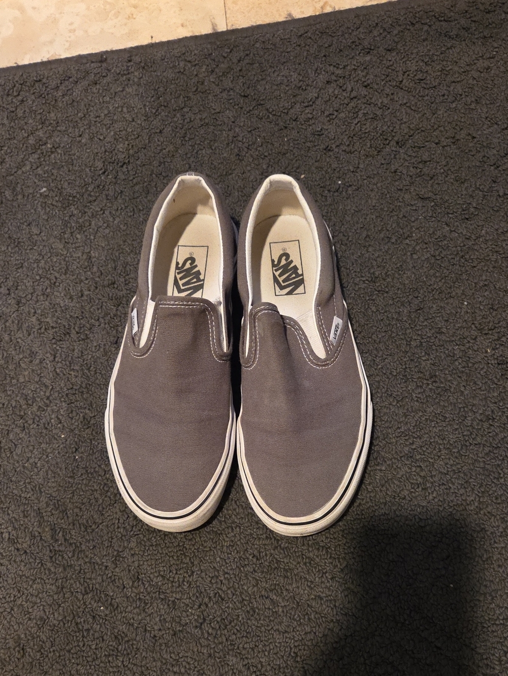 Vans Slip-On Canvas Sneakers in Gray and White